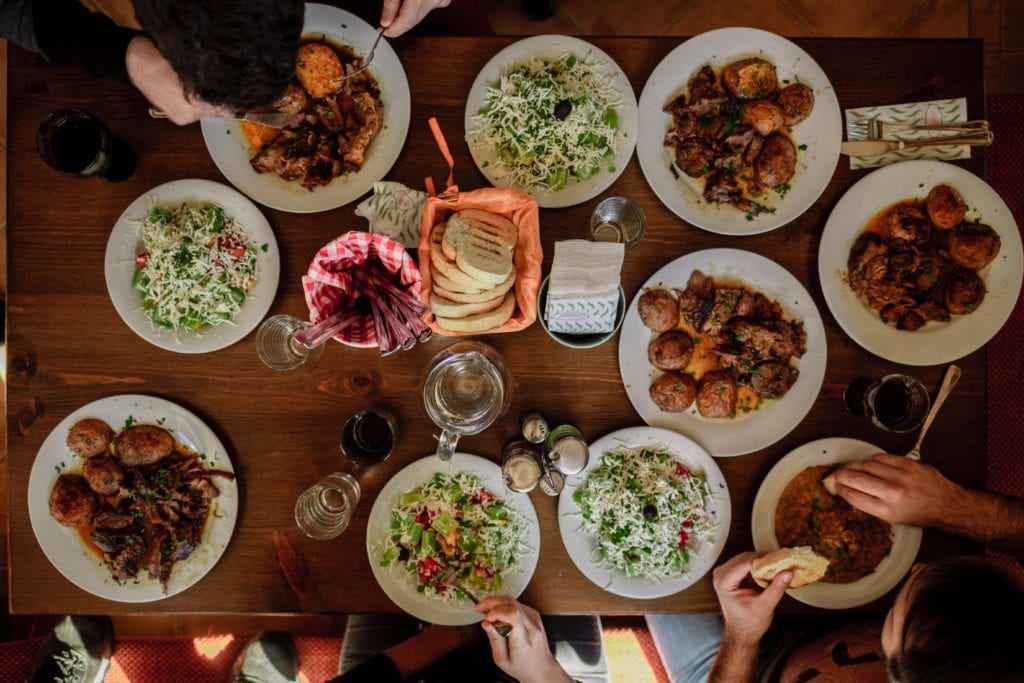 family eating a meal together photo taken from above