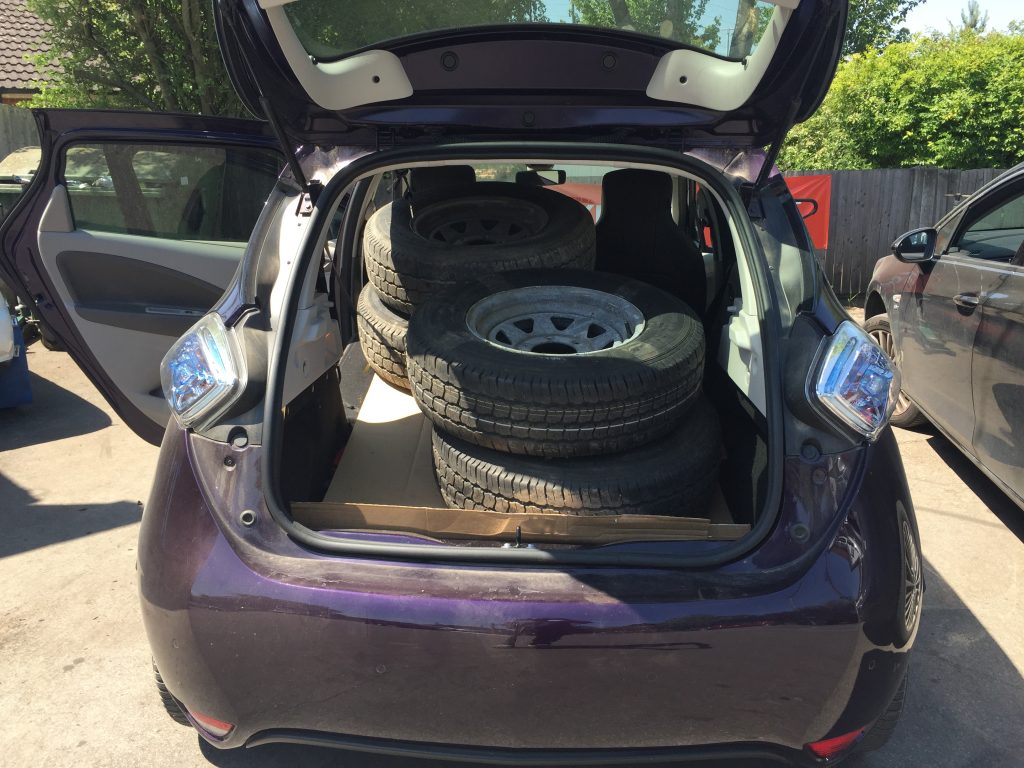 4 land cruiser tyres inside the back of purple Renault Zoe car - life with an electric vehicle