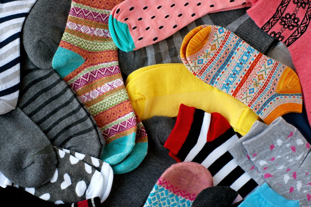 lots of colourful socks laid out